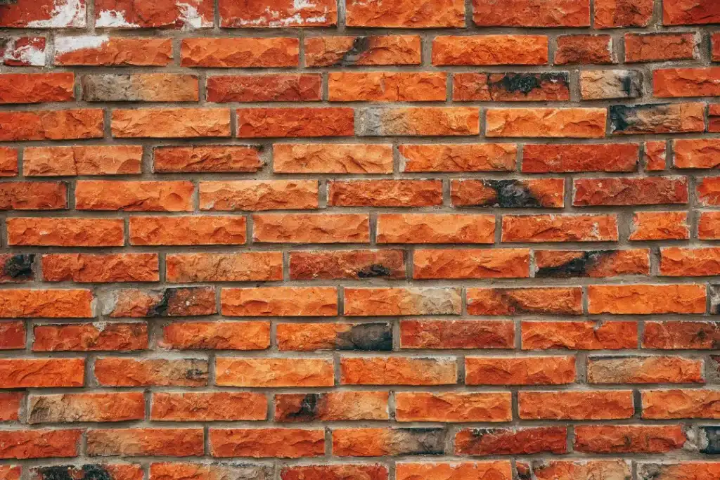 Brick wall showcasing clean, well-maintained bricks, highlighting the importance of professional brick cleaning for structural integrity and aesthetic appeal.